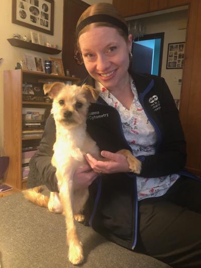 Joanna Leon holding Rico, her foster dog
